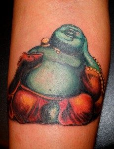 Laughing Buddha Tattoo on Arm