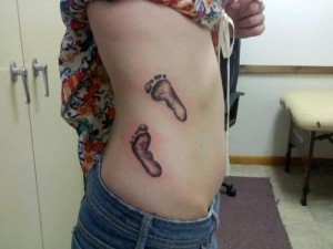 Baby Footprint Tattoo on Ribs