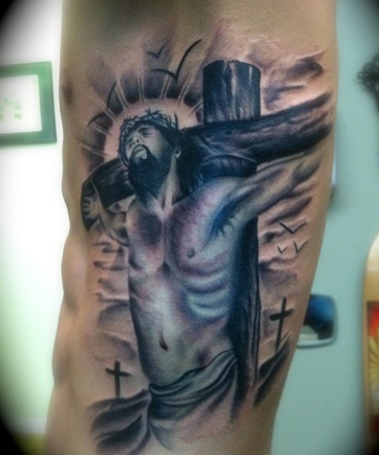 Hand of god crucifixion tattoo