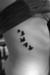 Small Bird Tattoos on Ribs