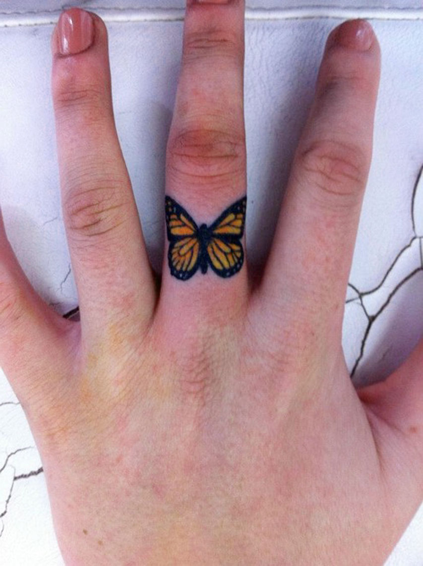 Butterfly tatto on finger