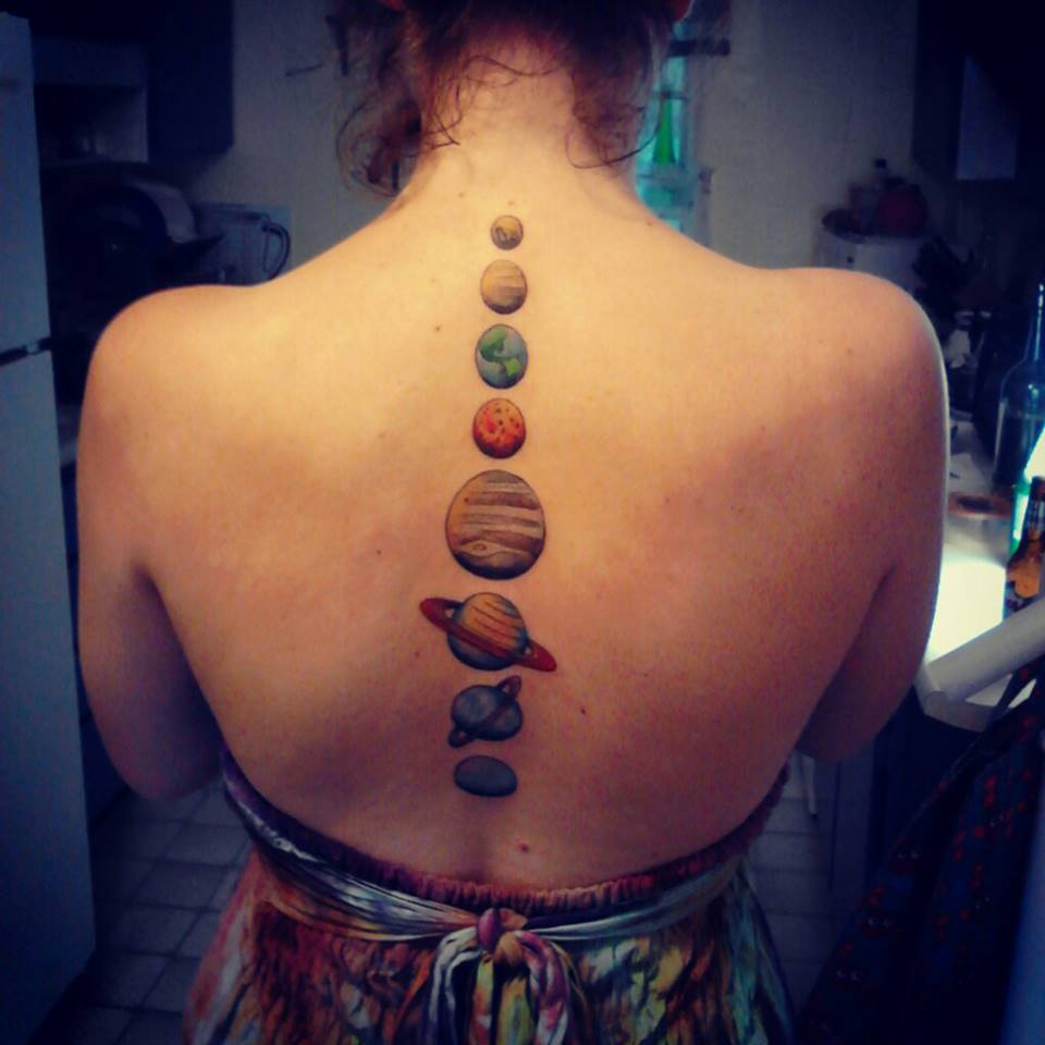 Planets Down Spine Tattoo